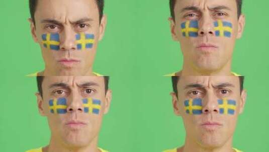 脸上画着瑞典国旗的严肃男人高清在线视频素材下载