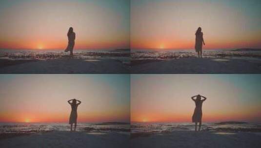 美女站在海边望向远处的夕阳高清在线视频素材下载