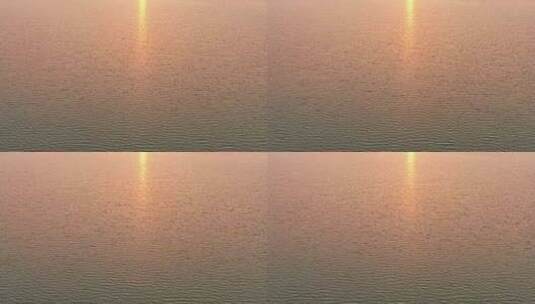 夕阳下波光粼粼的湖面高清在线视频素材下载