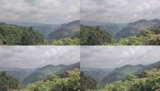 在群山之间拍摄远处的山脉高清在线视频素材下载