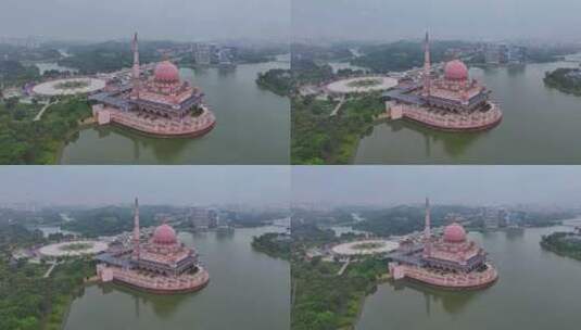 马来西亚布城粉色水上清真寺建筑景观航拍高清在线视频素材下载