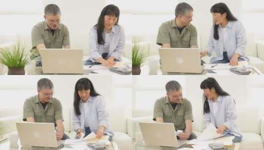 亚洲夫妇工作上的个人财务高清在线视频素材下载