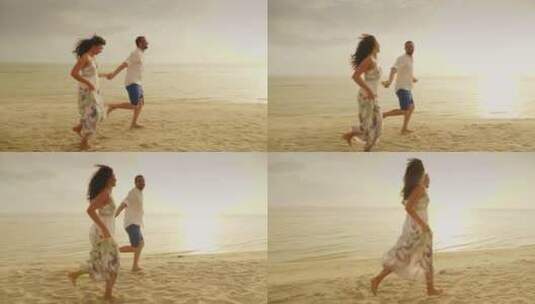 夫妇在沙滩上一起奔跑高清在线视频素材下载