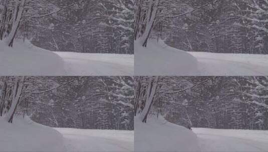 一辆汽车在积雪的山路上行驶高清在线视频素材下载