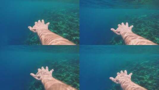 水下潜水的一只手高清在线视频素材下载