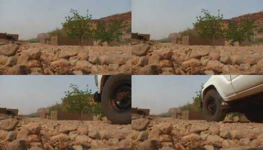 吉普车在石头路上行驶高清在线视频素材下载