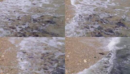 大风天海水夹杂着海藻冲刷沙滩60帧高清在线视频素材下载