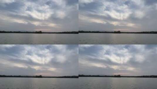 北京春日圆明园湖面上空的万里祥云高清在线视频素材下载