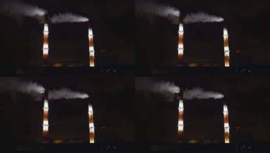夜间从工厂冒出的烟高清在线视频素材下载