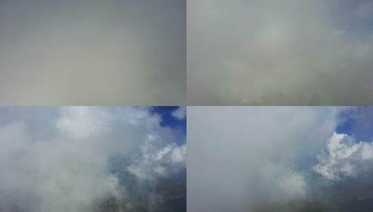 云中穿梭航拍下降看到风车山高清在线视频素材下载