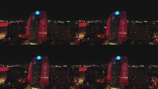 海口市新海航大厦夜景左环绕高清在线视频素材下载