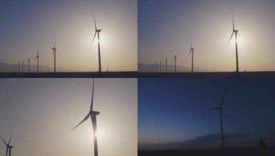 逆光拍摄清晨和傍晚的风车风力发电车组镜头高清在线视频素材下载