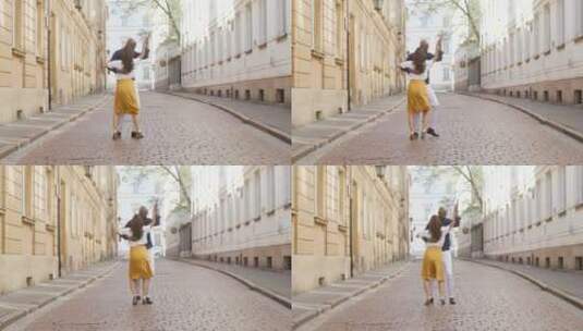 情侣在街道相拥跳舞高清在线视频素材下载