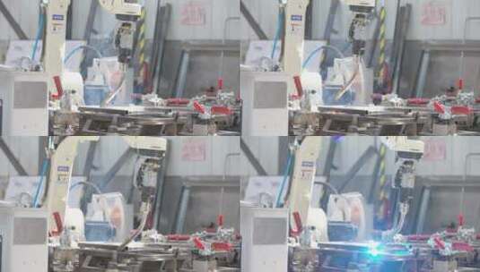 工厂里的机械臂电焊切割高清在线视频素材下载