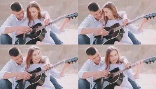 男朋友教女朋友如何弹吉他高清在线视频素材下载