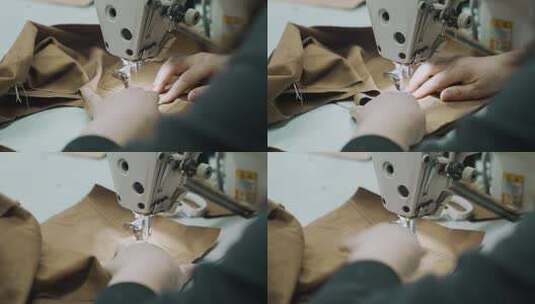 制衣厂工人裁剪缝制衣服高清在线视频素材下载