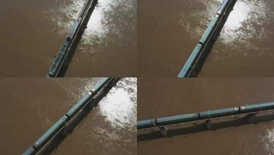 火车快速的经过桥梁驶过黄河高清在线视频素材下载