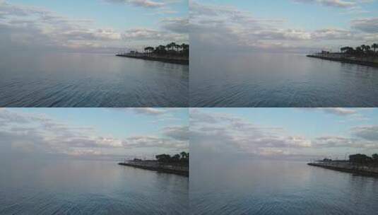 宁静的湖水映衬着美丽的云彩高清在线视频素材下载