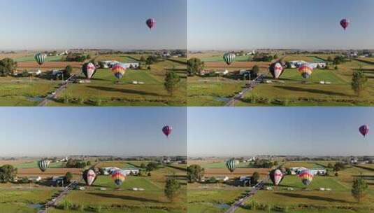 当热气球着陆并在宾夕法尼亚州兰开斯特县移动时，静态无人驾驶飞机拍摄高清在线视频素材下载