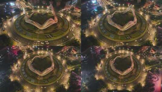 武汉光谷国际广场夜景航拍交通俯拍车流转盘高清在线视频素材下载