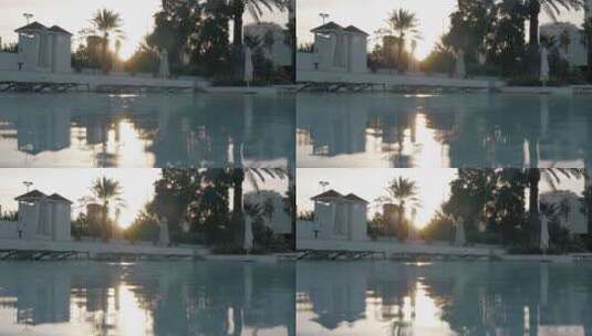 日落时的酒店游泳池高清在线视频素材下载