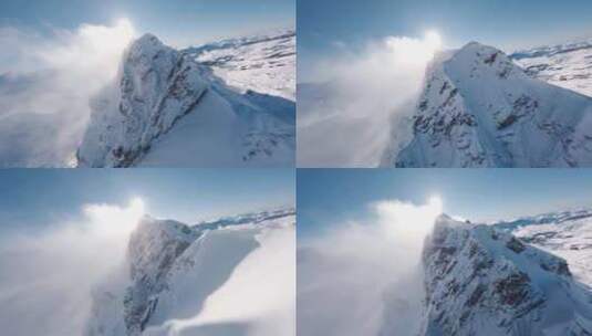 无人机飞越雪山山脊高清在线视频素材下载
