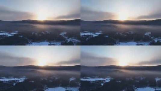 航拍冻雾笼罩的林海雪原朝阳高清在线视频素材下载
