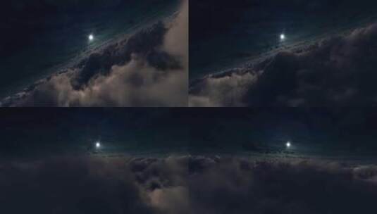 穿过云层飞向明亮的满月高清在线视频素材下载