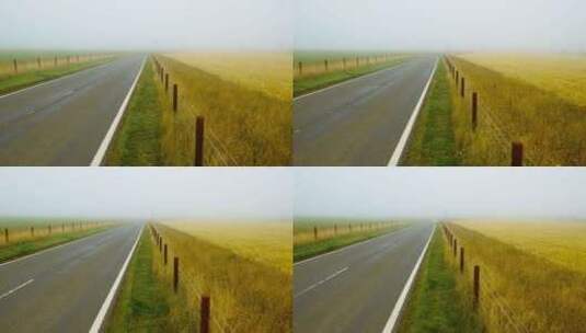 迷雾笼罩的空旷道路高清在线视频素材下载