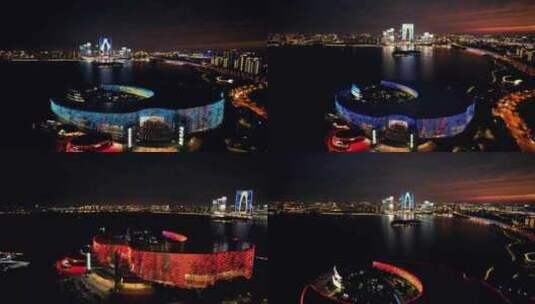 苏州文化艺术中心金鸡湖夜景灯光航拍高清在线视频素材下载