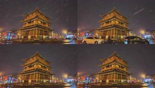 山西大同古城鼓楼夜景飘雪下雨雪景高清在线视频素材下载