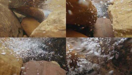 河水流经岩石激起水泡高清在线视频素材下载