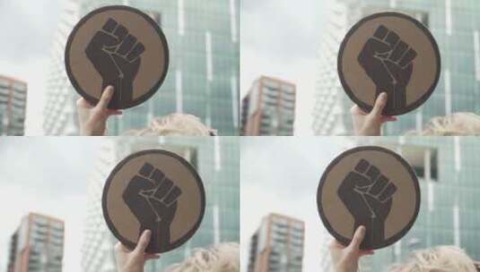 伦敦抗议者举起拳头标志高清在线视频素材下载