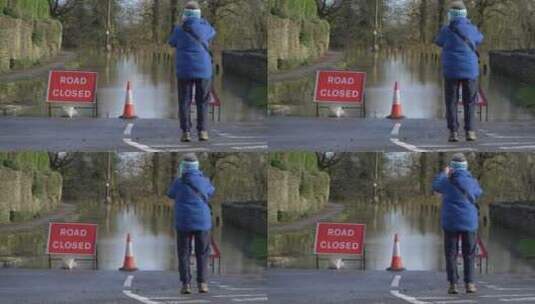行人拍摄洪水道路的长镜头高清在线视频素材下载