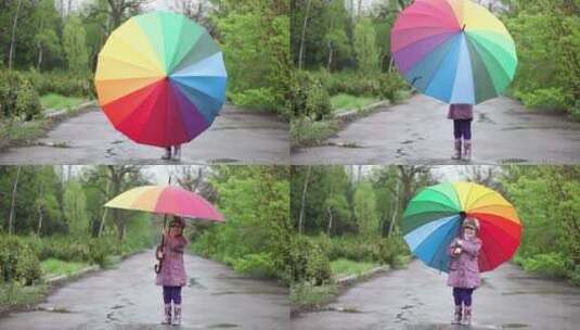 躲在雨伞后的小女孩高清在线视频素材下载