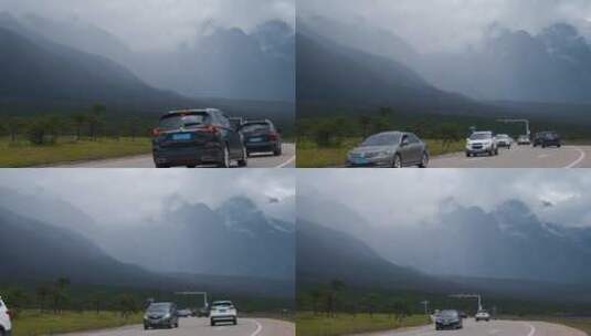 雨雾大山视频阴云笼罩丽江玉龙雪山公路高清在线视频素材下载