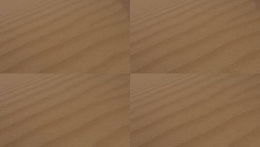 风吹过沙漠沙丘的特写镜头高清在线视频素材下载