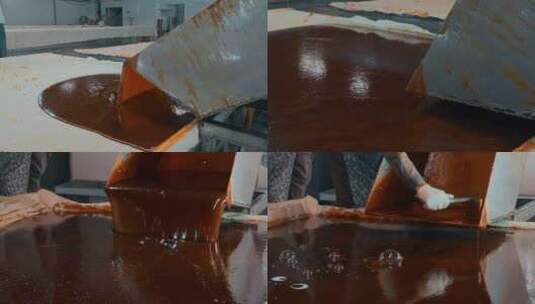 工业糖厂生产糖浆糖倾倒摊铺自然凝固特写高清在线视频素材下载