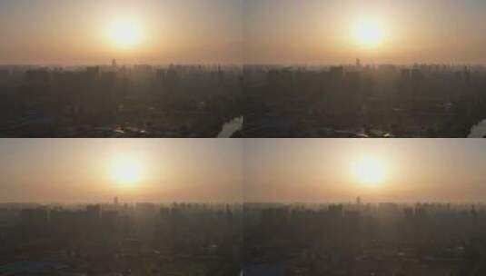 河南许昌城市日落迷雾航拍高清在线视频素材下载