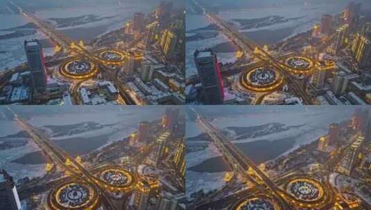 中国黑龙江哈尔滨公路大桥夜晚雪景航拍高清在线视频素材下载