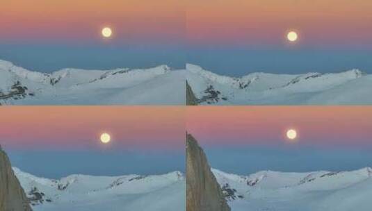 航拍雪山月亮升起高清在线视频素材下载