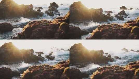 夕阳下海浪拍打礁石高清在线视频素材下载