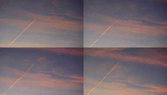 飞机飞过晚霞天空高清在线视频素材下载