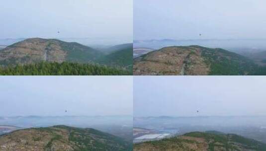 航拍枣庄新城热气球飞行高清在线视频素材下载