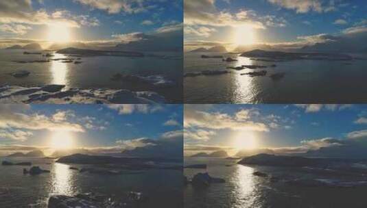 南极洲日落雪岛前鸟瞰高清在线视频素材下载