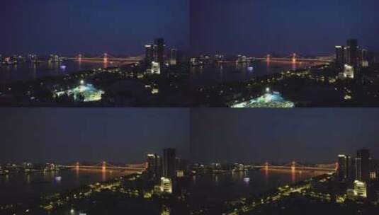 中国湖北省武汉市汉阳区汉江晴川桥夜景航拍高清在线视频素材下载