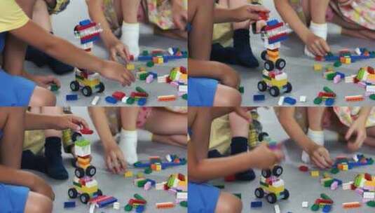 特写孩子们在幼儿园玩积木玩具高清在线视频素材下载