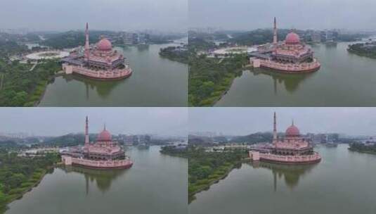 马来西亚布城粉色水上清真寺建筑景观航拍高清在线视频素材下载