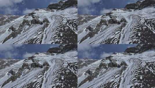 航拍攀登岷山山脉主峰雪宝顶雪山的登山队高清在线视频素材下载