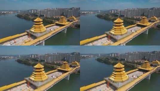 广西柳州凤凰岭大桥风雨亭金色塔顶两岸高楼高清在线视频素材下载